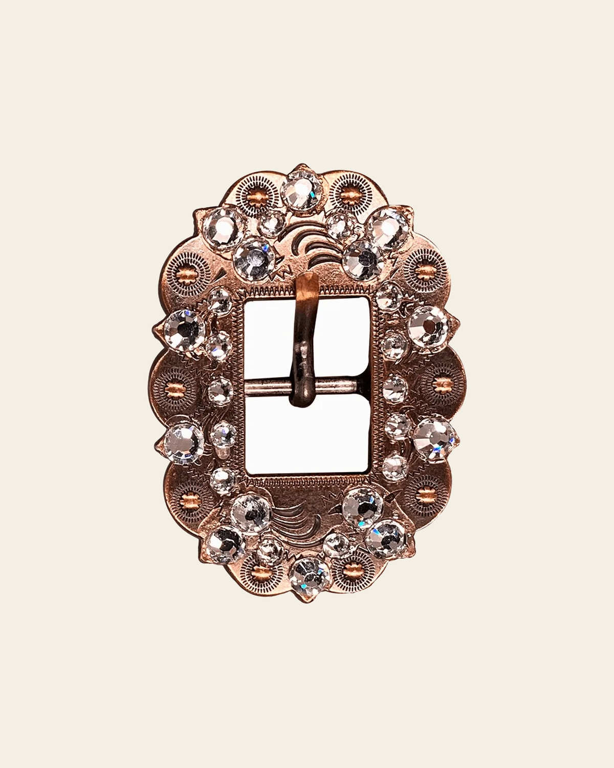 Clear Copper European Crystal Cart Buckle on a warm cream background
