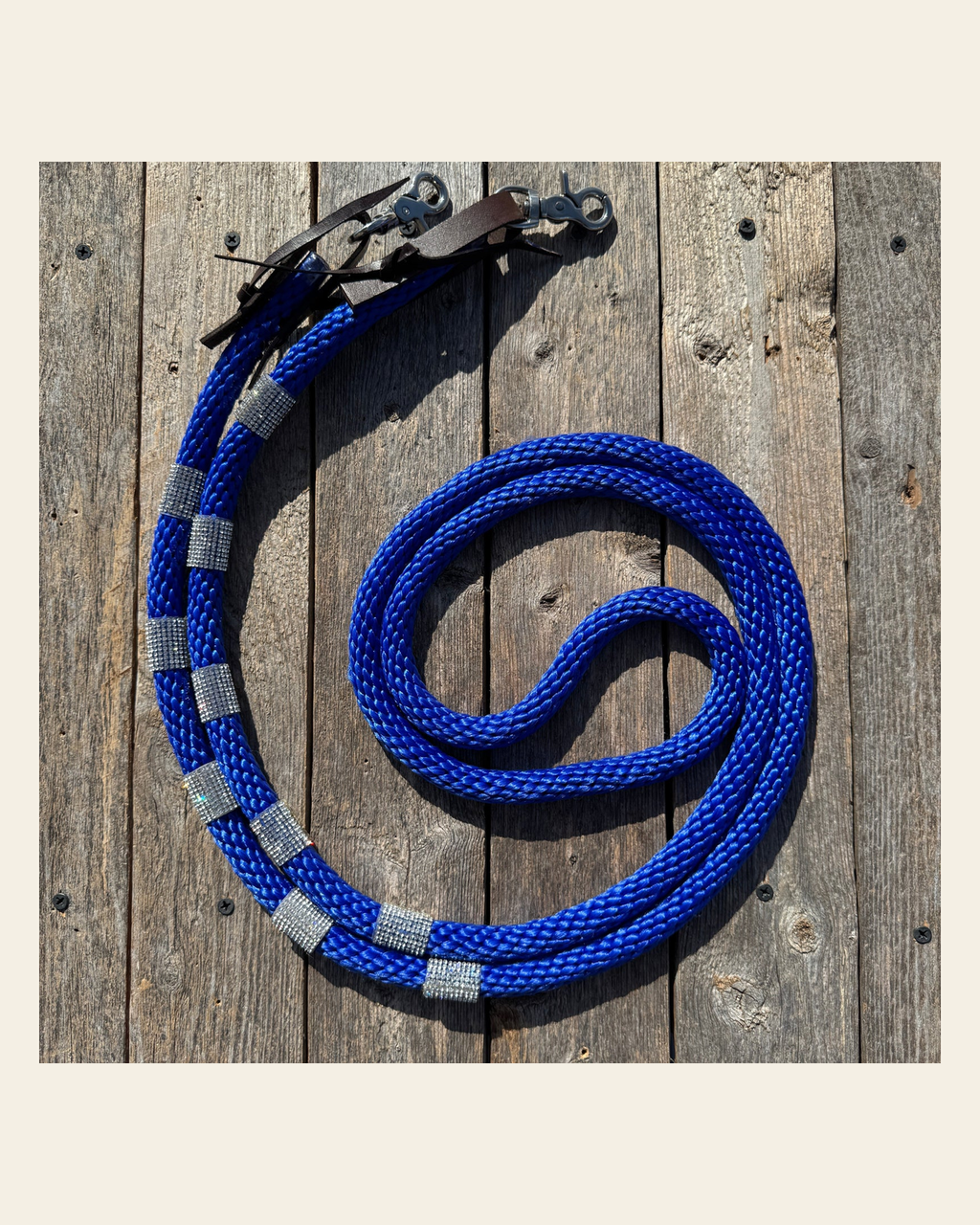 Cobalt Nylon Barrel Racing Reins with Rhinestones #BNR105 on a warm cream background