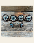 Copper Amethyst Aqua & Clear Saddle Conchos on a warm cream background