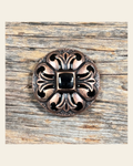 Copper Black Fleur De Lis Concho 1.25” W241L on a warm cream background