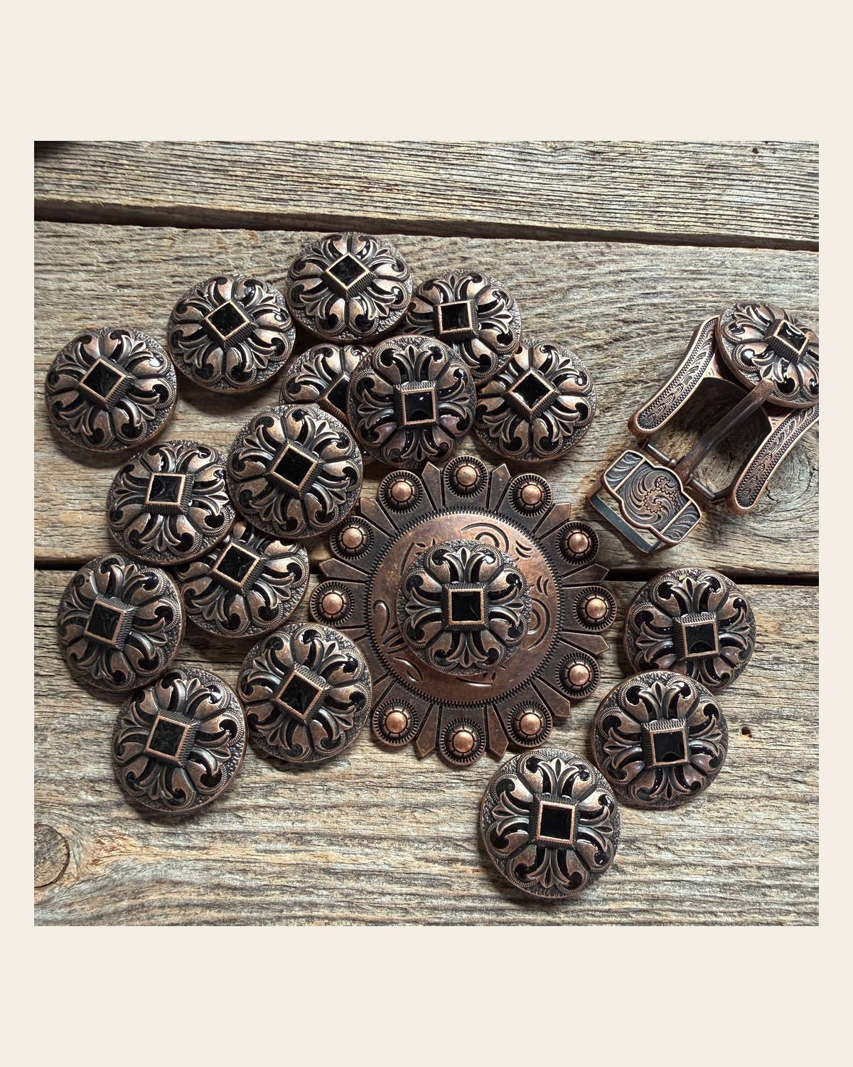 Copper Black Fleur De Lis Western Concho W241 on a warm cream background