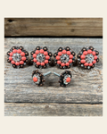Copper Fashion Coral and Clear Saddle Conchos on a warm cream background