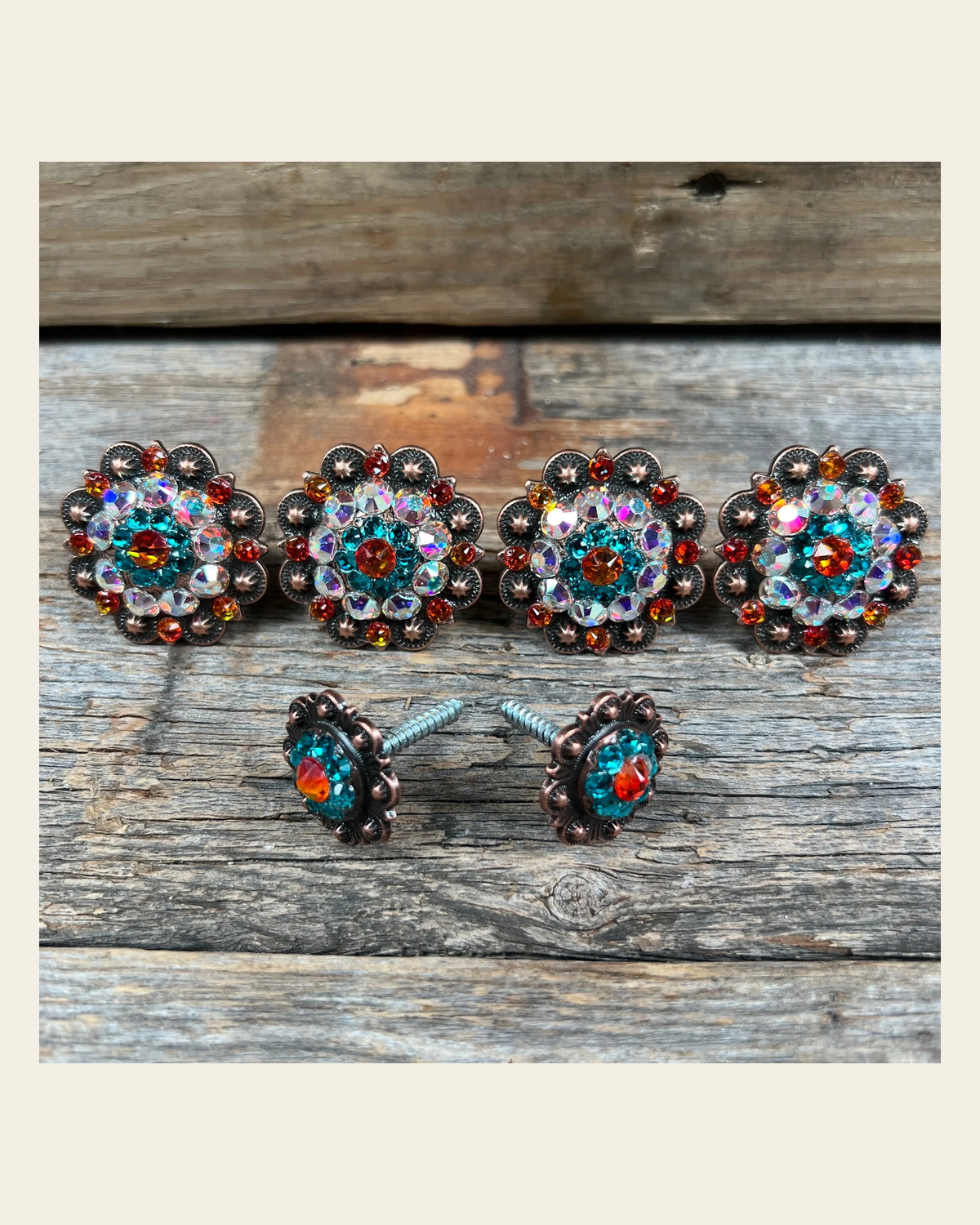 Copper Fire Opal Teal & AB Saddle Conchos on a warm cream background