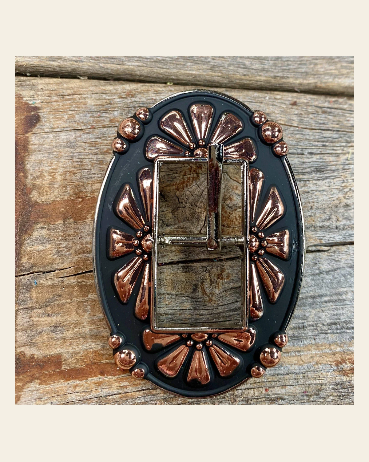 Copper Flower Buckle W196B on a warm cream background