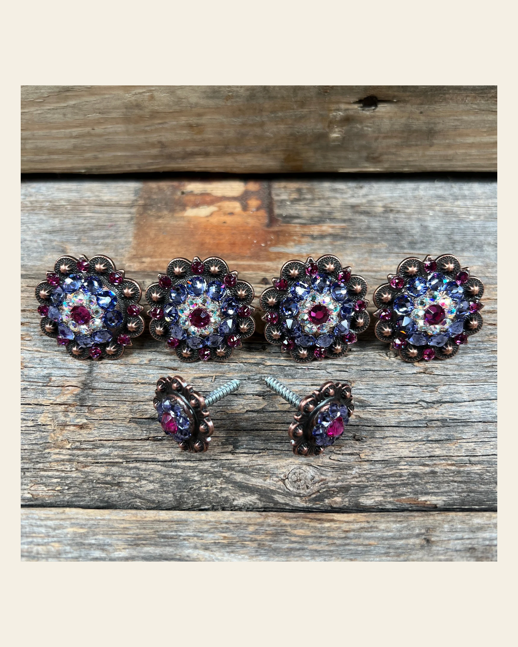 Copper Fuchsia AB & Lilac Saddle Conchos on a warm cream background