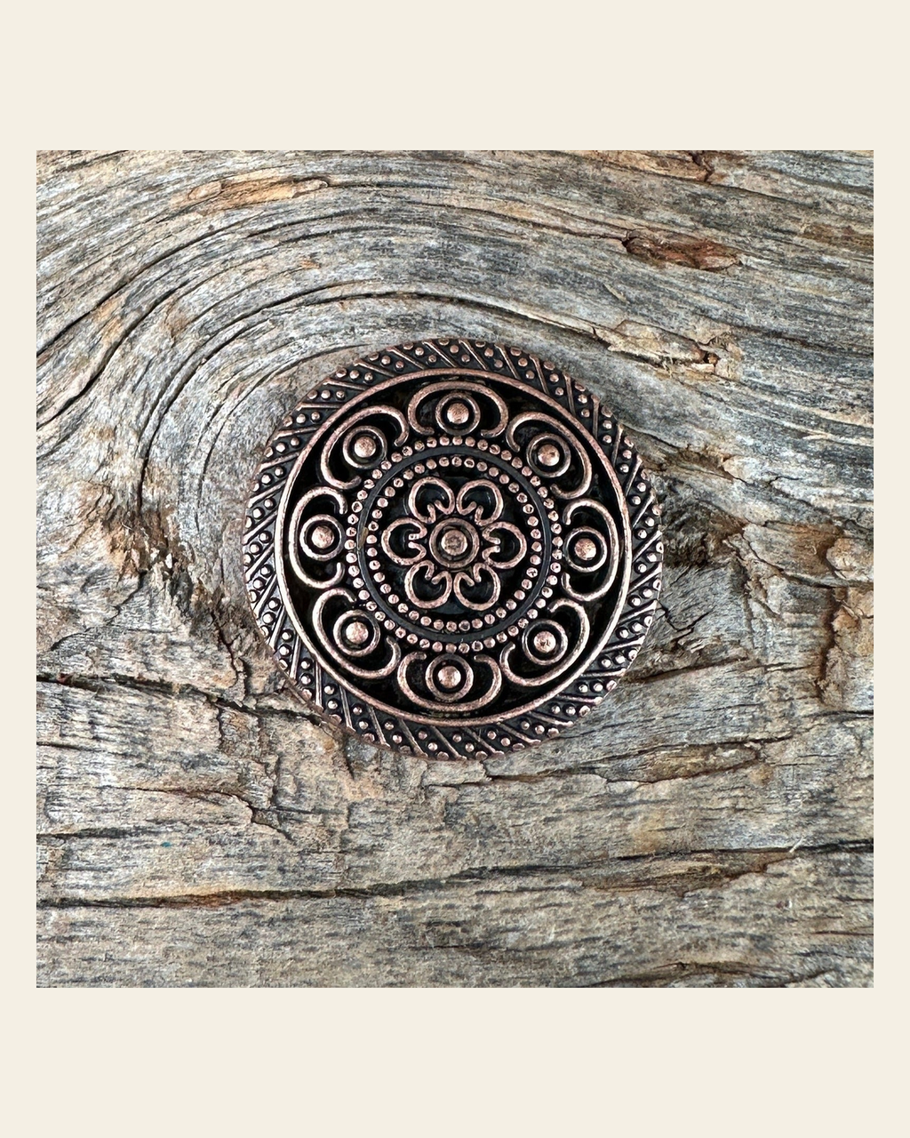 Copper Intricate Engraved Concho 1" W224S on a warm cream background