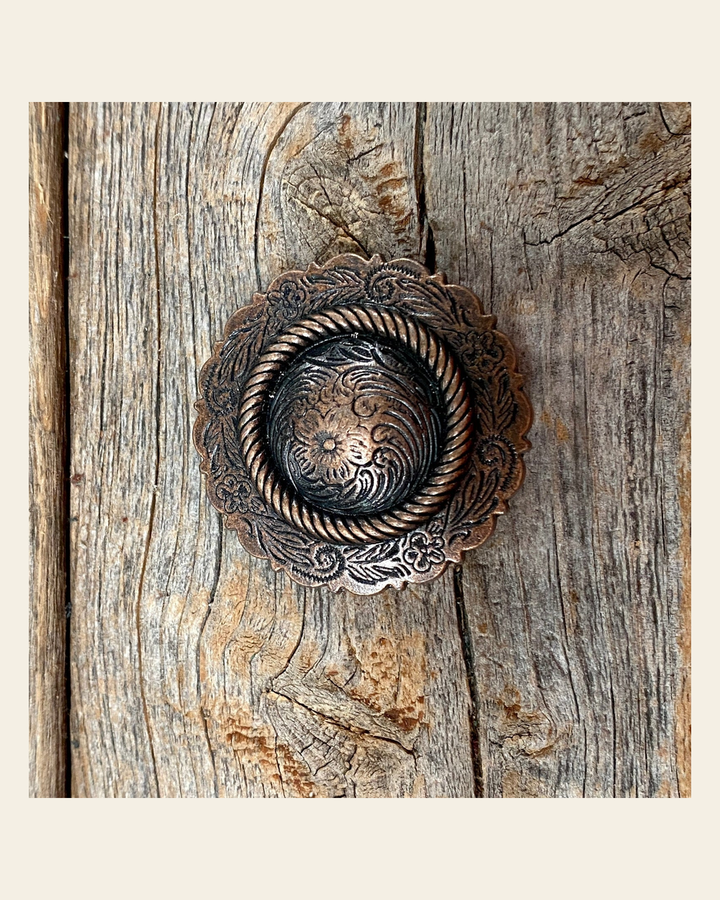 Copper Round Concho 1.5" W101L on a warm cream background