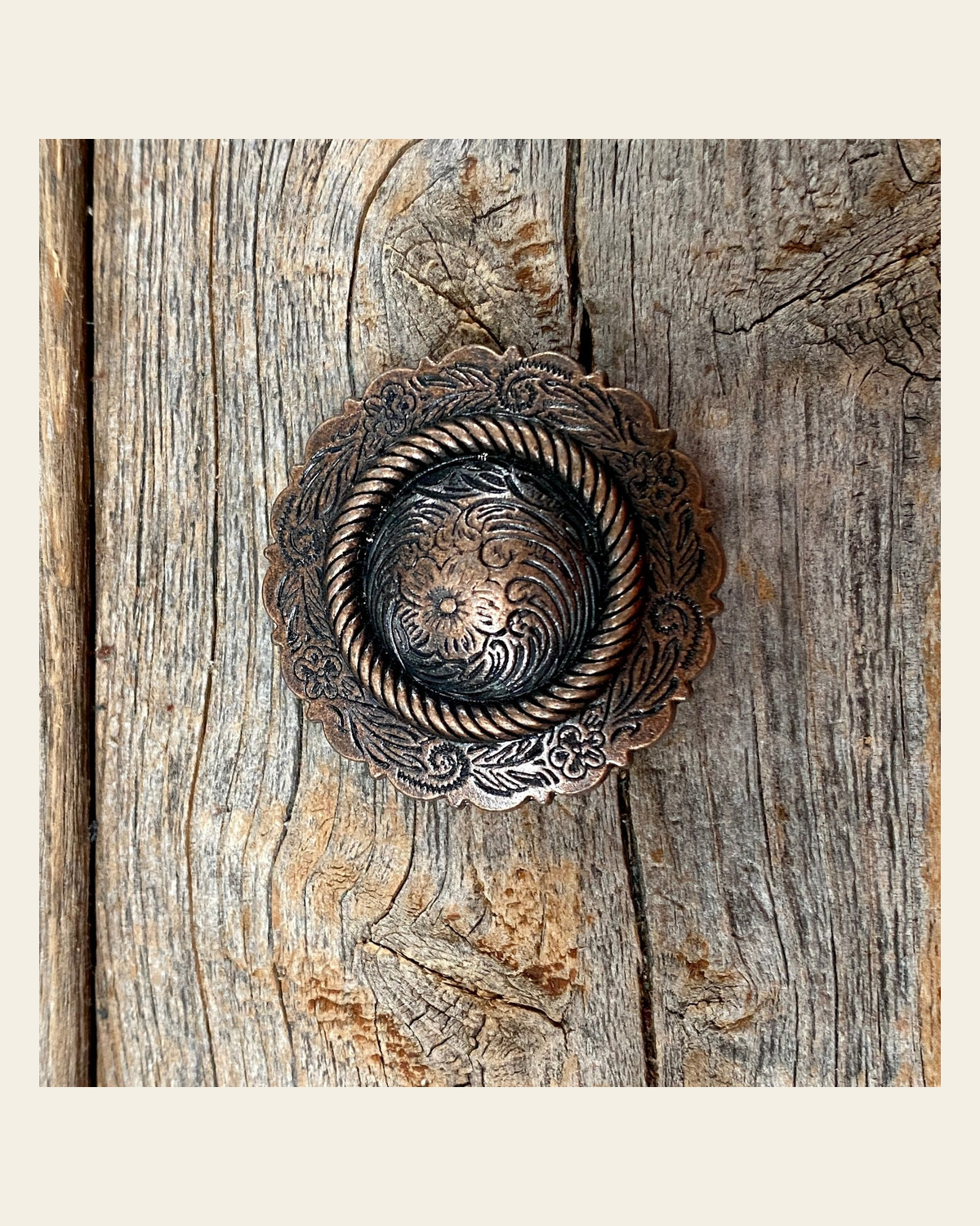 Copper Round Concho 1.5" W101L on a warm cream background