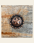 Copper Star Concho 1.25" W175L on a warm cream background