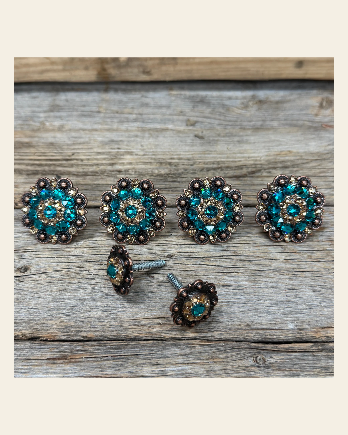 Copper Teal and Champagne Saddle Conchos on a warm cream background