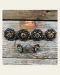 Copper Teal Champagne and Topaz Saddle Conchos on a warm cream background