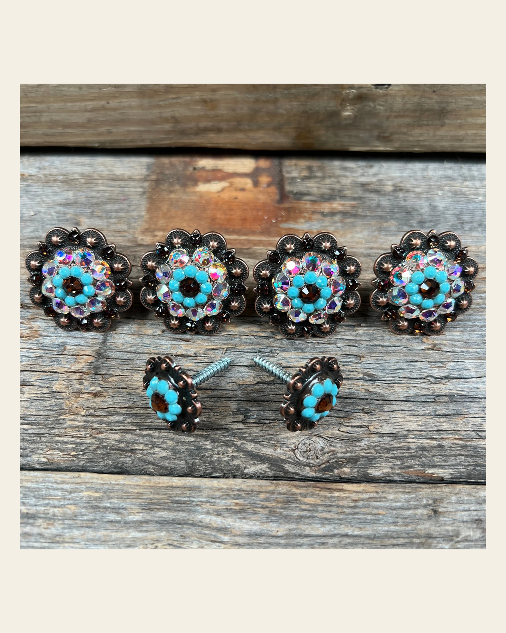 Copper Topaz Turquoise & AB Saddle Conchos on a warm cream background