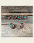 Copper Turquoise Blossom Saddle Set SSW206 on a warm cream background