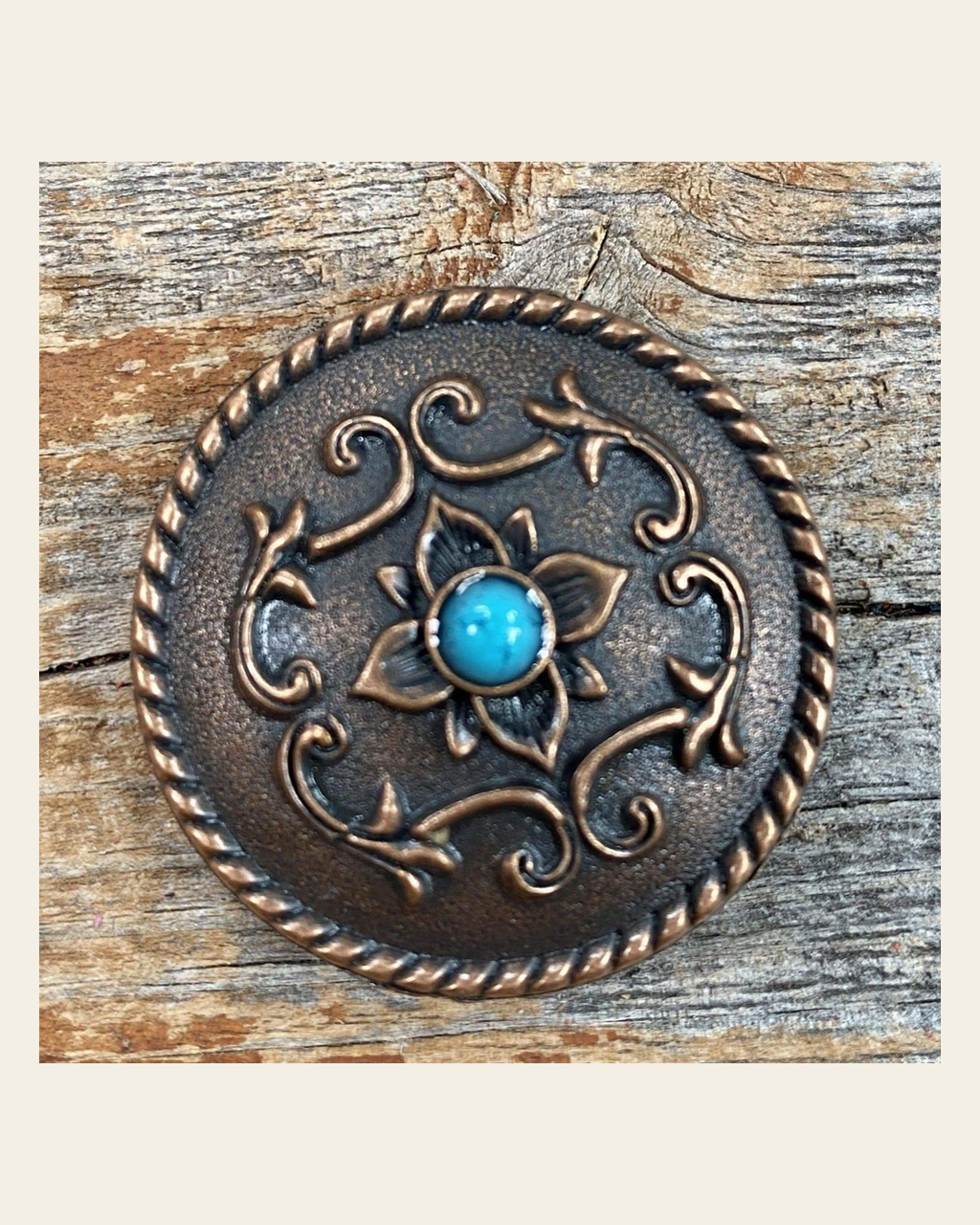Copper Turquoise Concho 1.5" W180L on a warm cream background