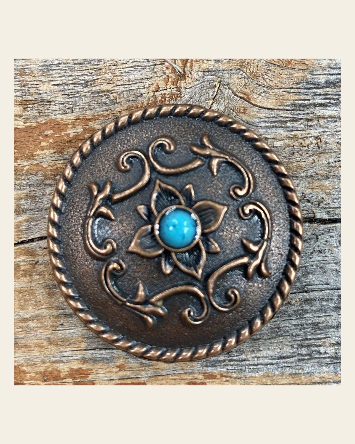 Copper Turquoise Concho 1.5" W180L on a warm cream background