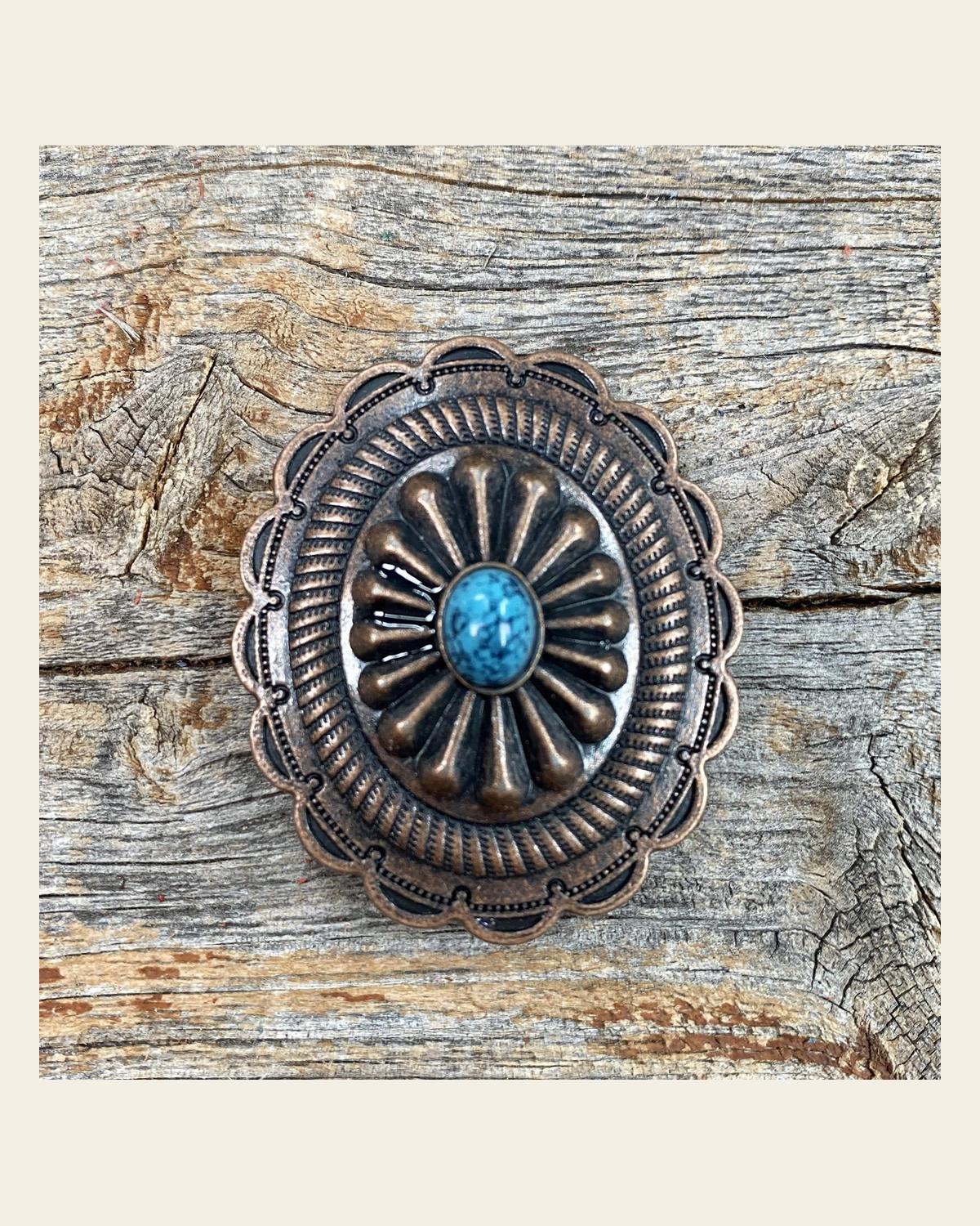 Copper Turquoise Oval Concho 3/4” W179S on a warm cream background