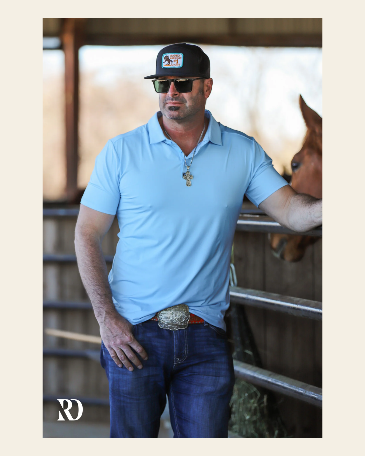 Sky Men's Performance Polo on a warm cream background