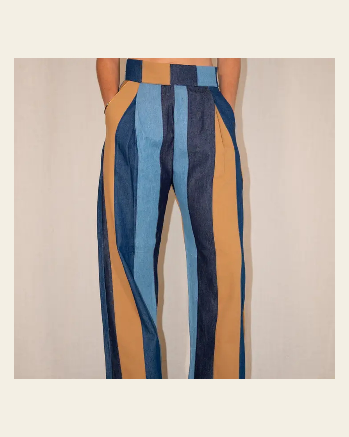 Cora Striped Denim | Pants on a warm cream background