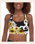 Cow Print Sunflower Sports Bra on a warm cream background