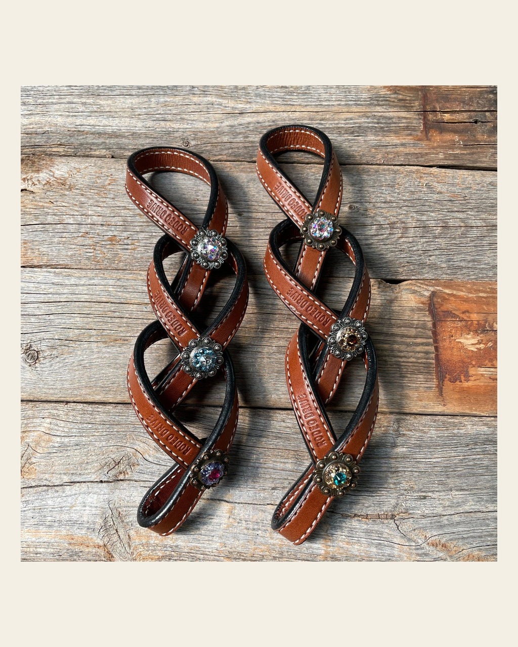 Crystal Medium Oil Rustic Tie Down Keepers on a warm cream background