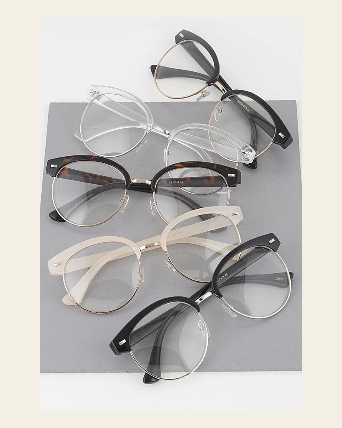Dad Glasses on a warm cream background