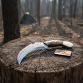 Damascus karambit knife..
