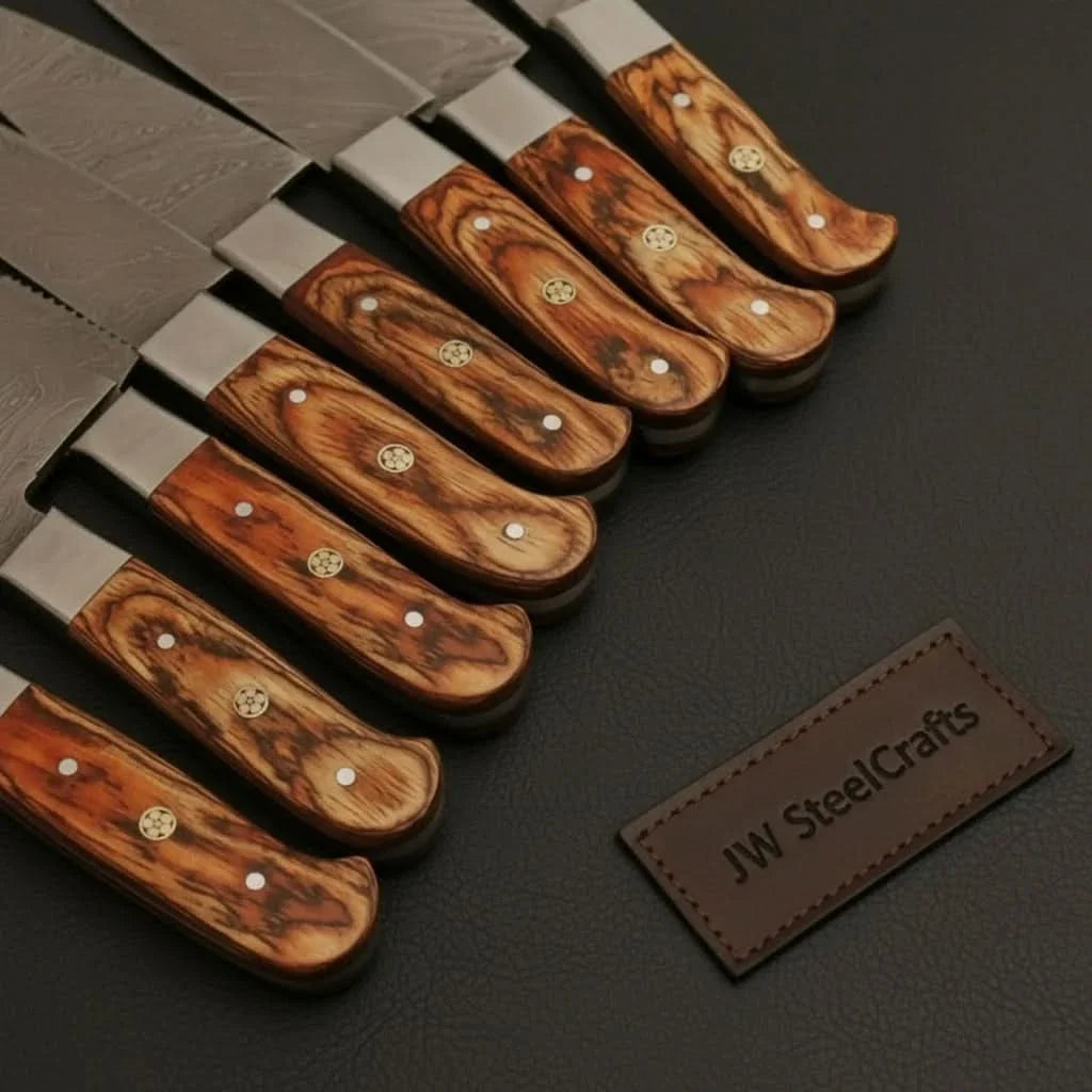 7-Piece Damascus Steel Kitchen Knife Collection with Flowing Water Pattern Blades.