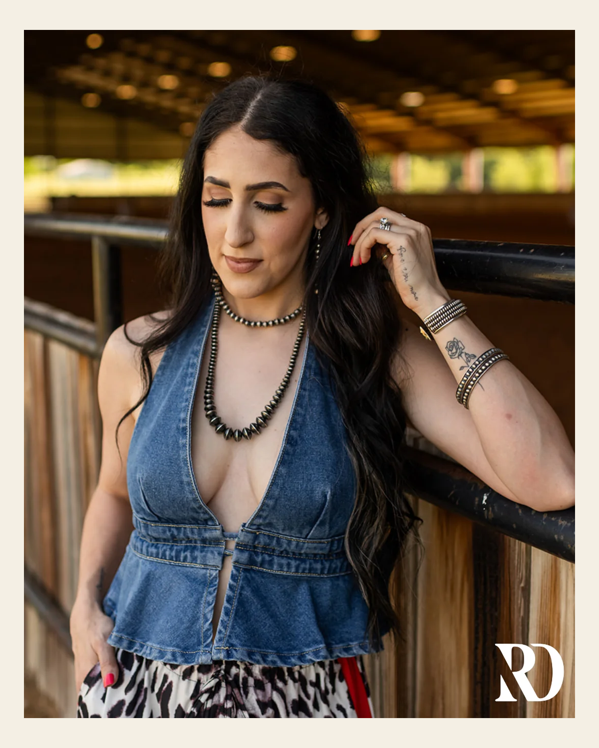 Darby Denim Halter | Top on a warm cream background