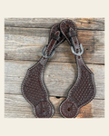 Dark Oil Genuine Leather Basketweave Tooled Spur Straps on a warm cream background