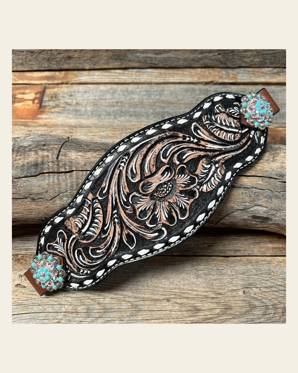 Dark Oil Buckstitch Bronc Noseband With Antique Silver Conchos on a warm cream background