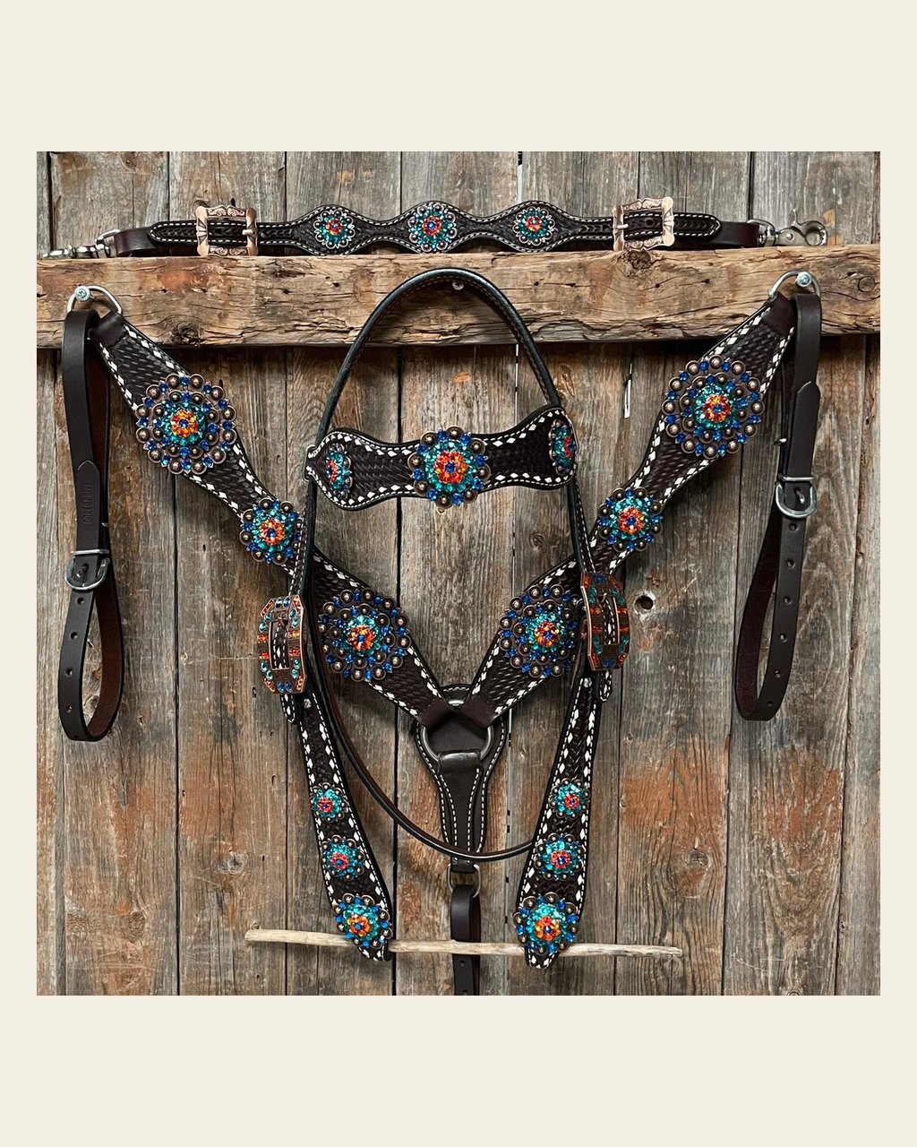 Dark Oil Buckstitch Capri/Fire Opal/Teal Browband/One Ear Tack Set with Wither Strap #BBBC471 on a warm cream background
