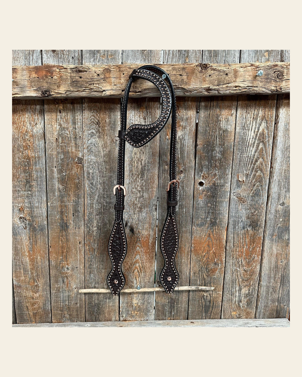 Dark Oil Honeycomb Tooled with Copper Dots One Ear Headstall / Bridle on a warm cream background