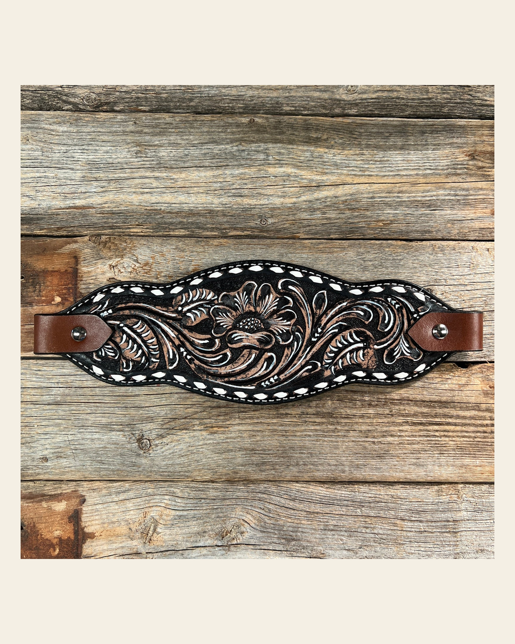 Dark Oil With Buckstitching Bronc Noseband on a warm cream background