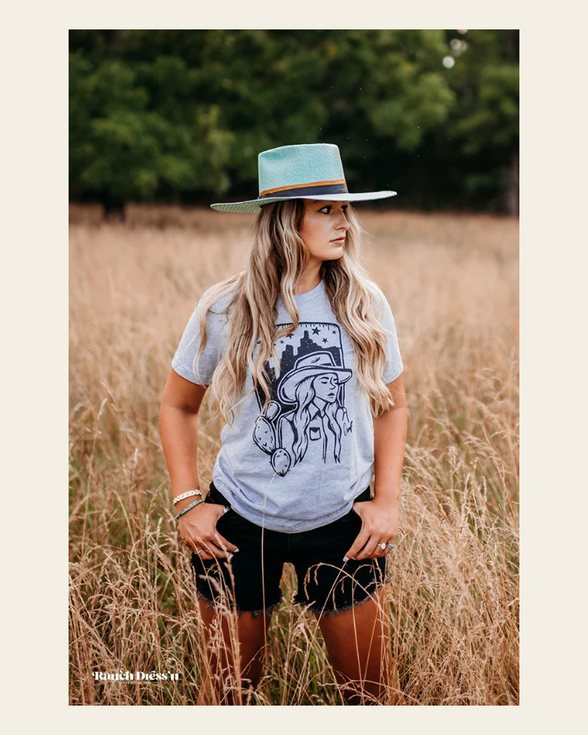 Desert Cowgirl - Athletic Heather Tee on a warm cream background
