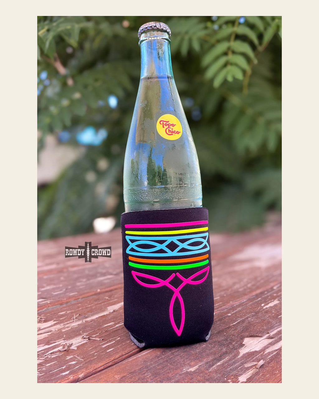 DS Neon Boot Stitch Koozie on a warm cream background