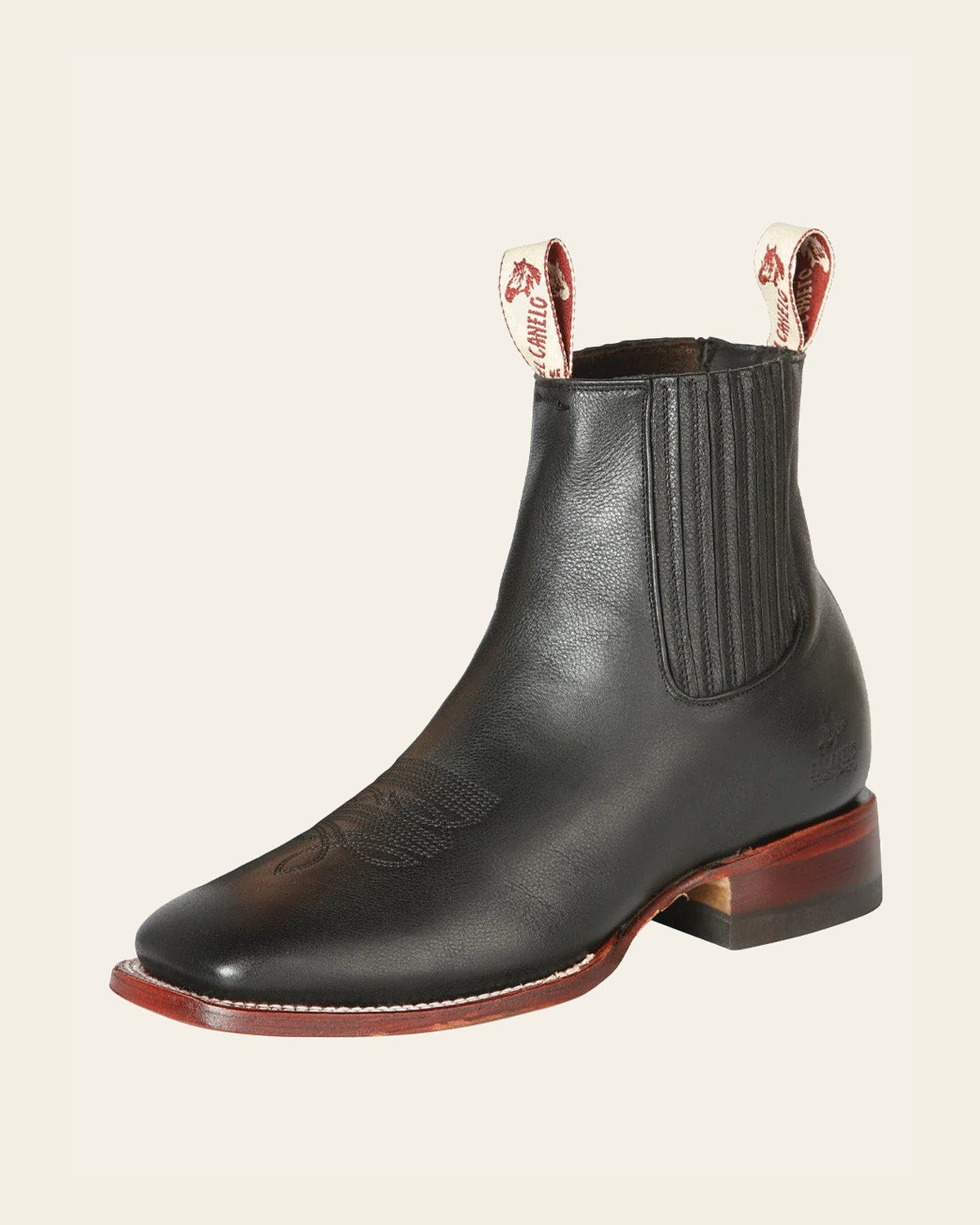El Canelo Men’s Fronterizo Leather Charro Cowboy Ankle Boots - Ikon Black 44240 on a warm cream background