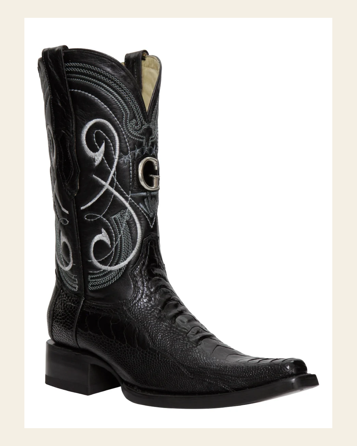 El General Men's Exotic Ostrich Leg Cowboy Boots - Black 45067 on a warm cream background