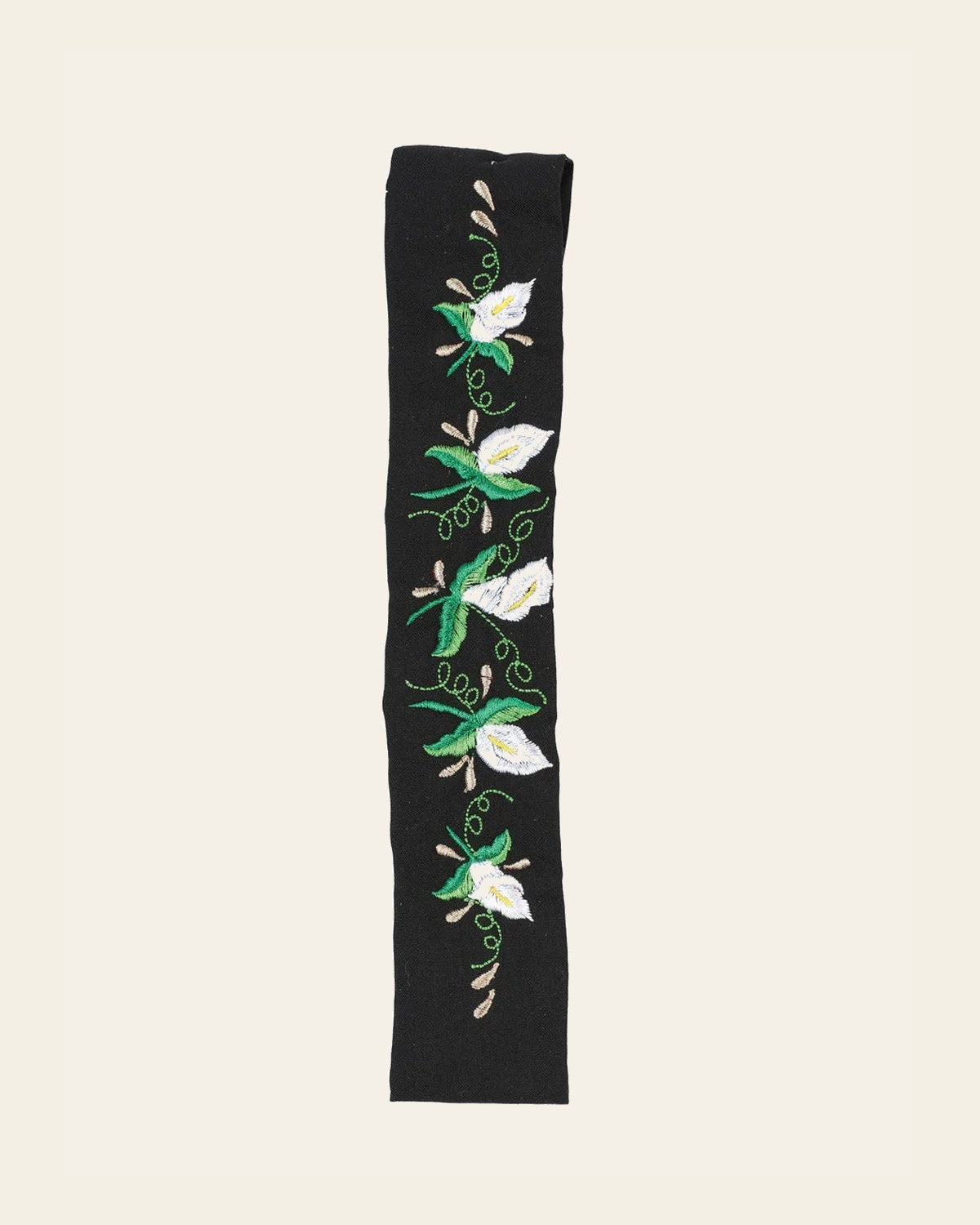Elastic Embroidered Headband Black 602768 on a warm cream background