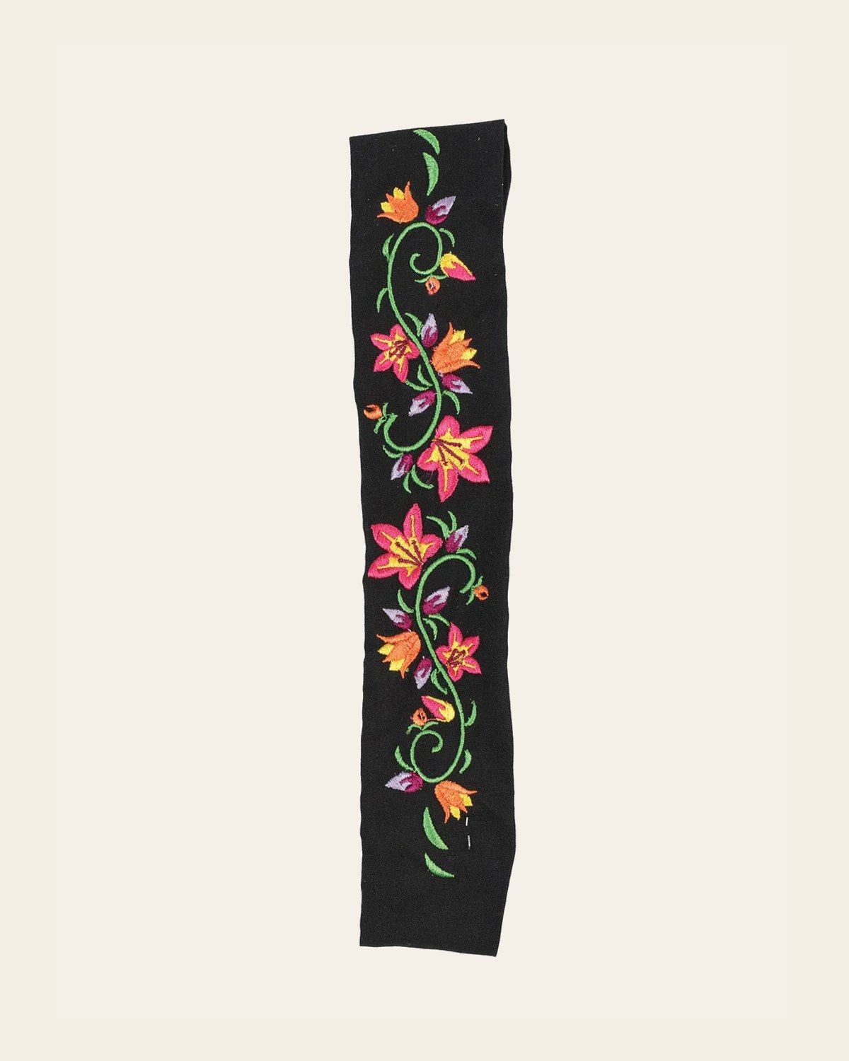 Elastic Embroidered Headband Black 602770 on a warm cream background