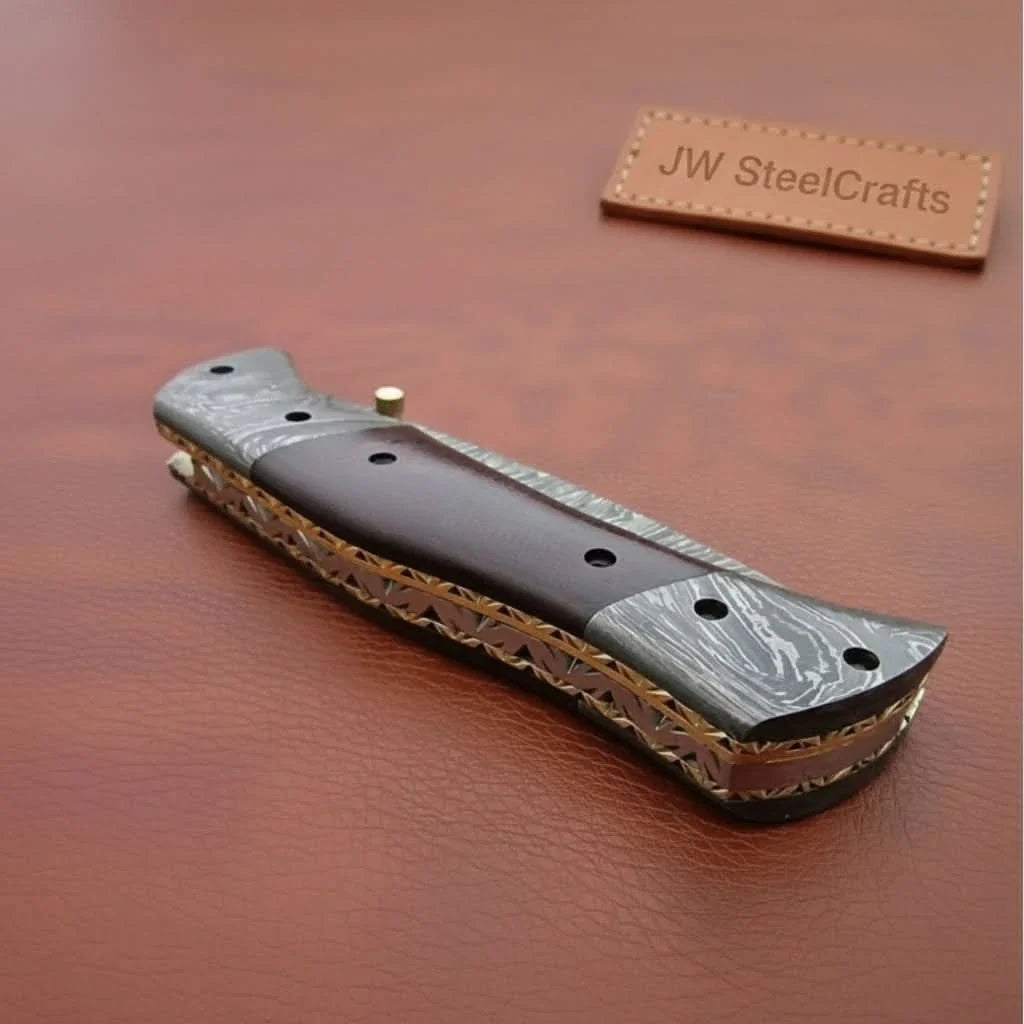 Handmade Damascus Steel Folding Knife – Matte Black Handle with Brass Liner & Thumb Stud | JW SteelCrafts