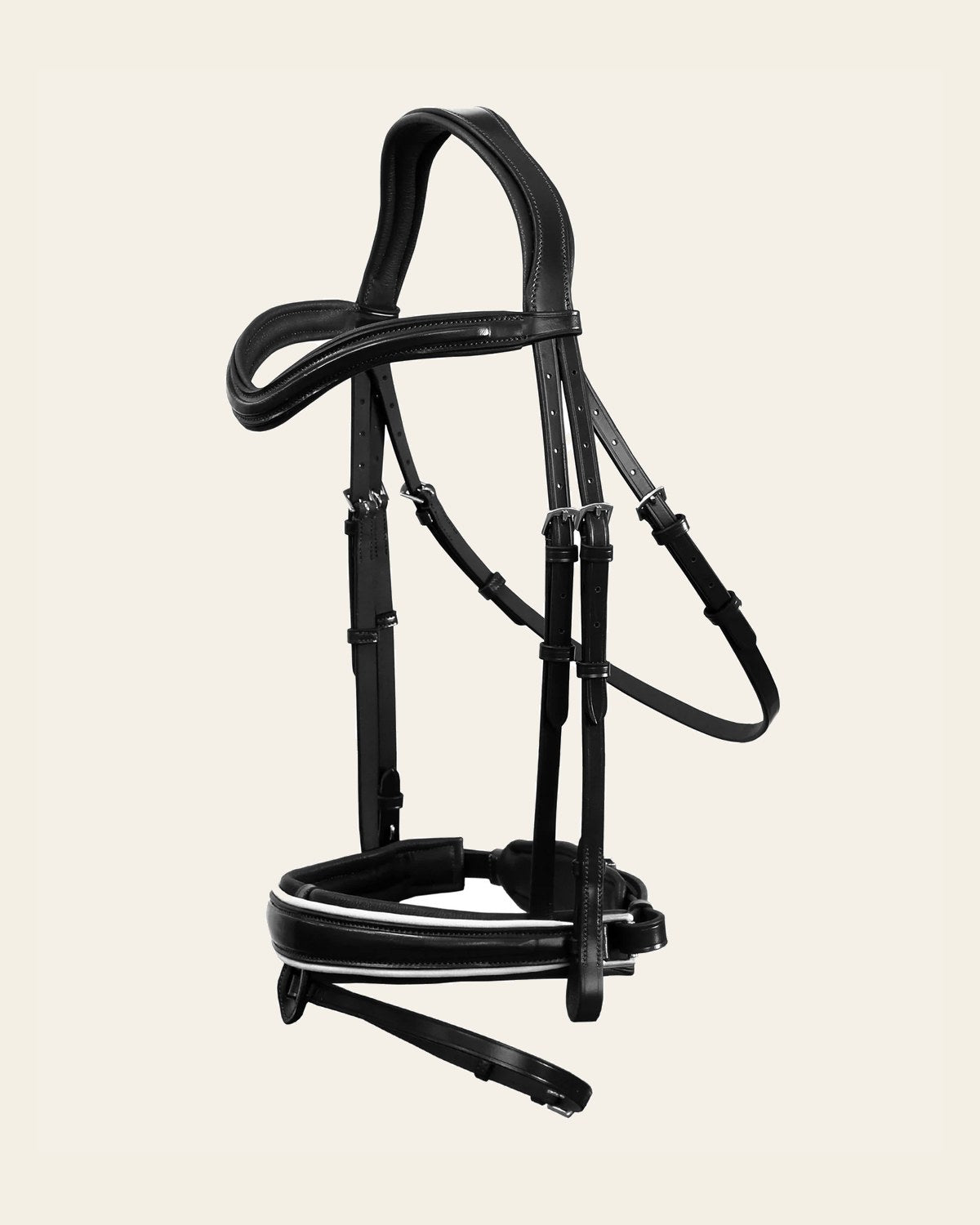 Exion 'Vega' White Piping Dressage Bridle with Reins on a warm cream background