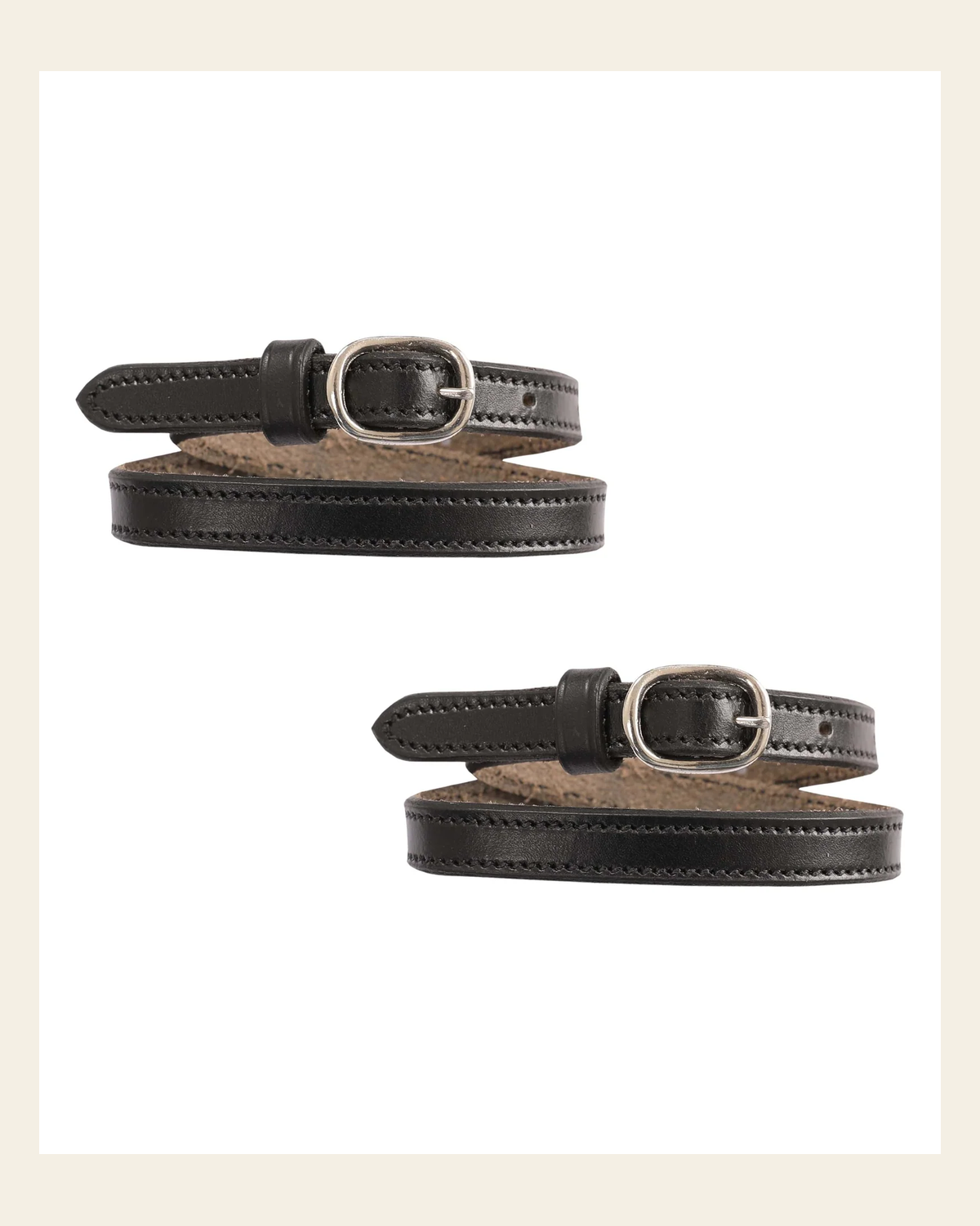ExionPro English Spur Straps on a warm cream background