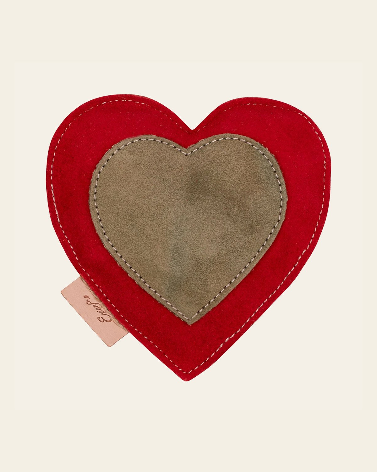 ExionPro Natural Leather Heart Dog Toy with Non Toxic Fiber Stuffing - Red Color on a warm cream background
