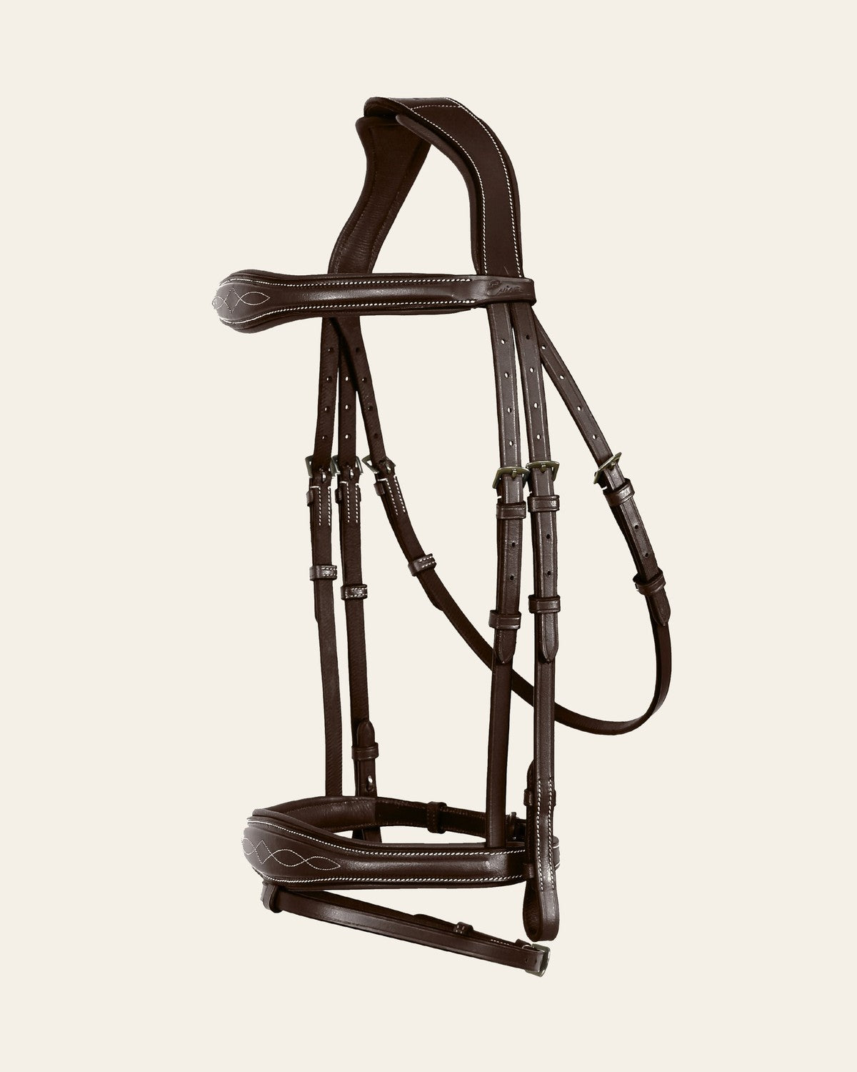 ExionPro 'Perseus' Anatomical Jumping Bridle with Reins on a warm cream background