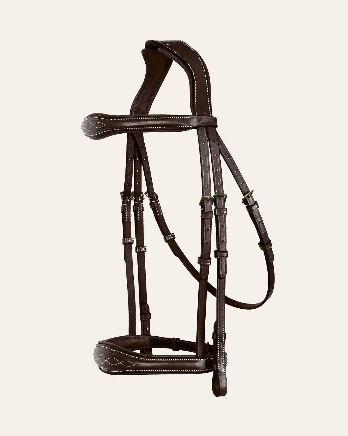 ExionPro 'Perseus' Anatomical Jumping Bridle without Flash with Reins on a warm cream background