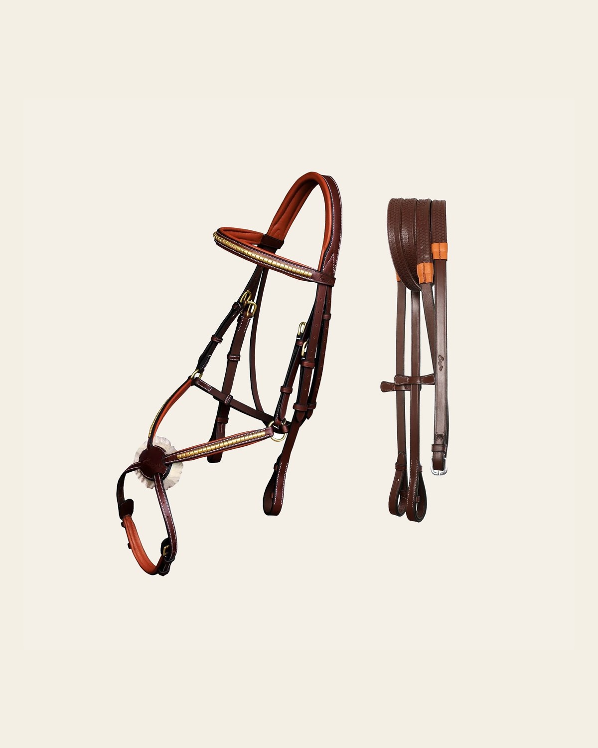 ExionPro SS / Brass Clincher Figure 8 Bridle with Rubber Reins on a warm cream background