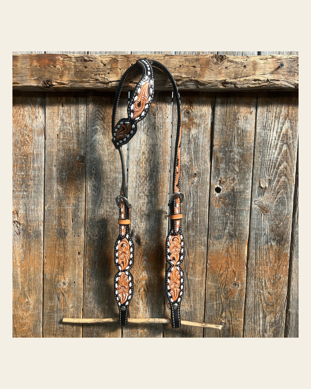Floral Tooled Buckstitch One Ear Headstall / Bridle on a warm cream background