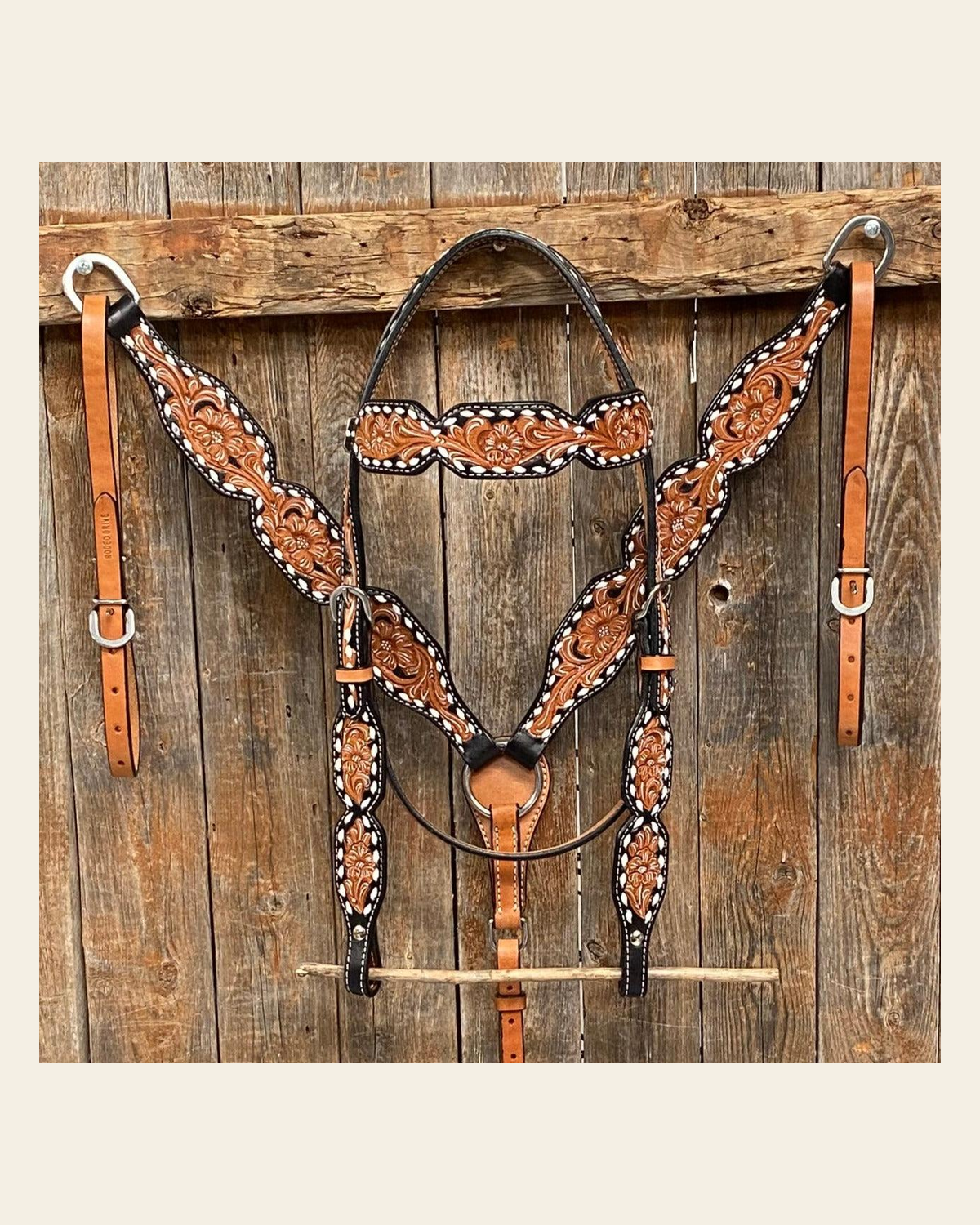 Floral Tooled Buckstitch Tack Sets on a warm cream background