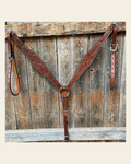 Floral Tooled Medium Oil Breastcollar on a warm cream background