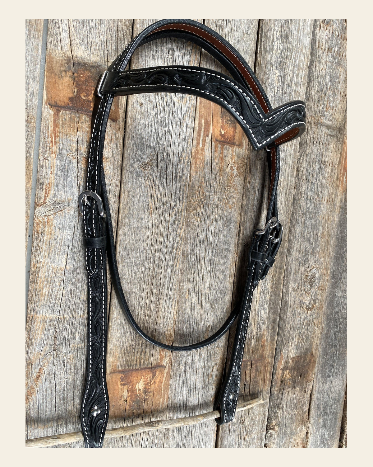 Floral V Browband Black Headstall / Bridle on a warm cream background